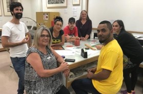 Artist Vicki Couzens with community print project participants